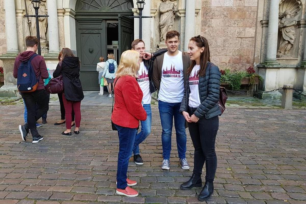 a group of people standing in front of a building