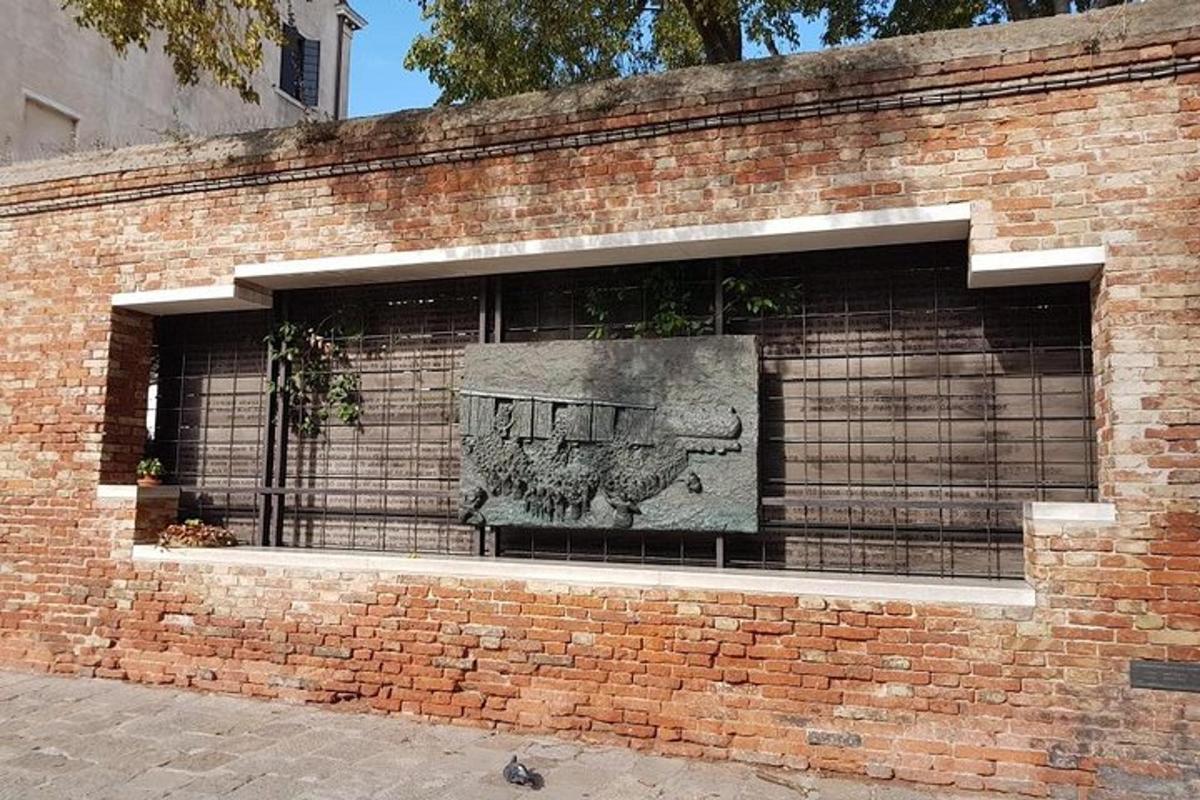 a brick wall with a picture in a window