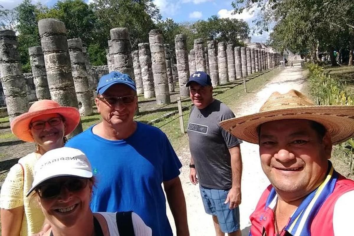 a group of people standing in front of a temple