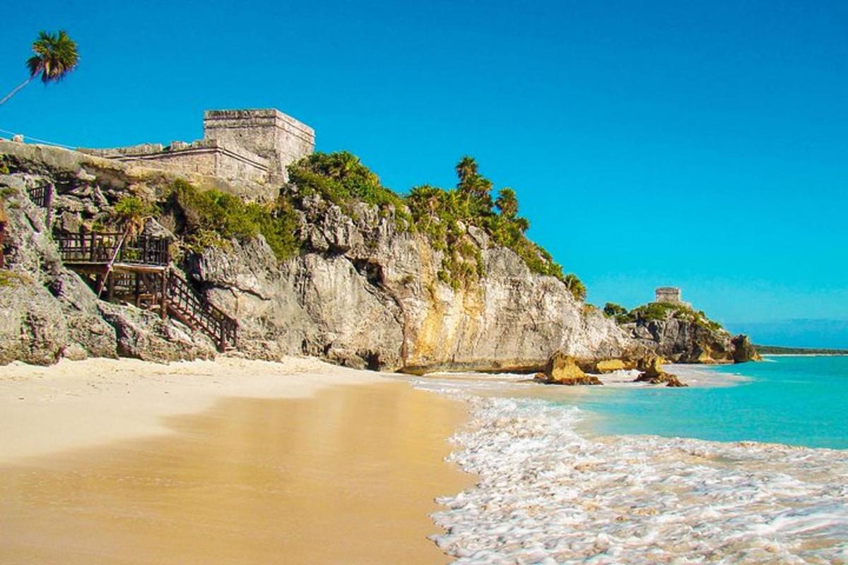 a view of a beach with a castle and the ocean