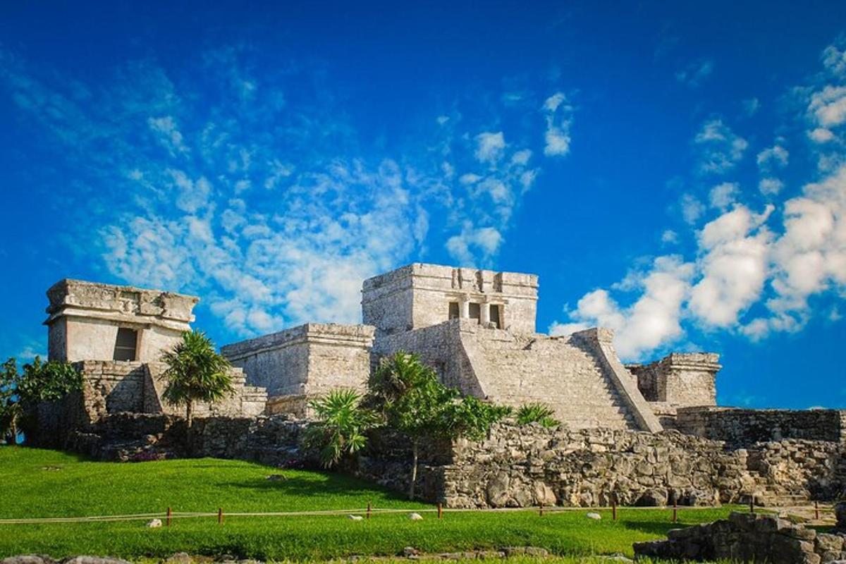 a castle on a hill with a blue sky