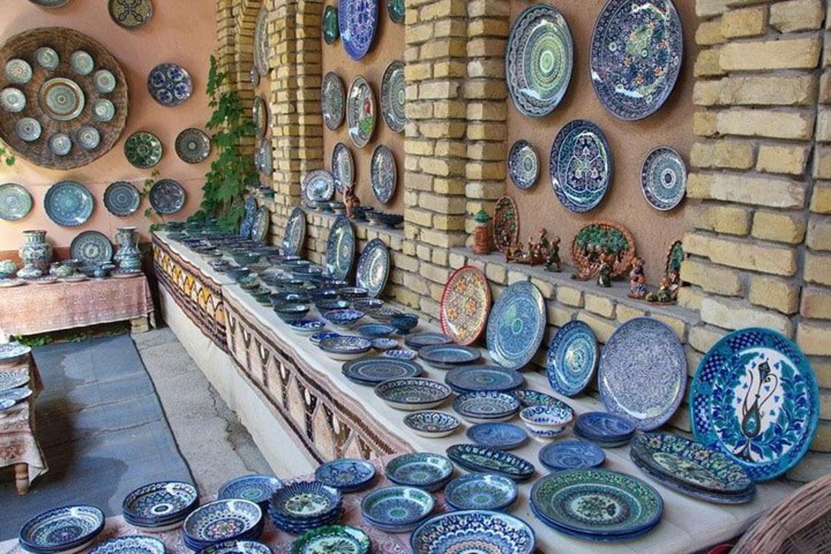 a display of plates and bowls on a wall