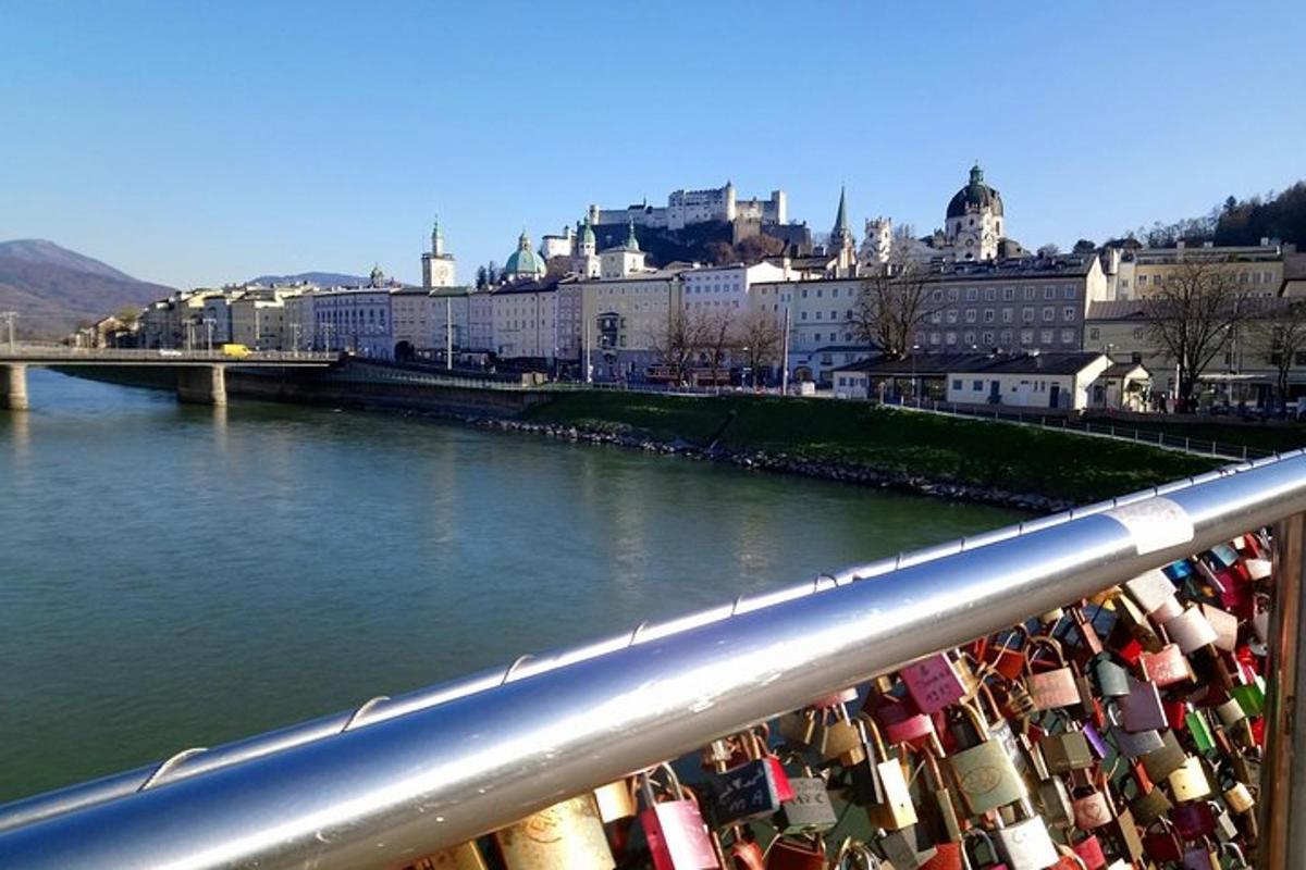 a bridge over a river with many padlocks on it