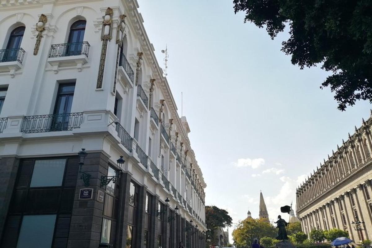 a white building on a street in a city