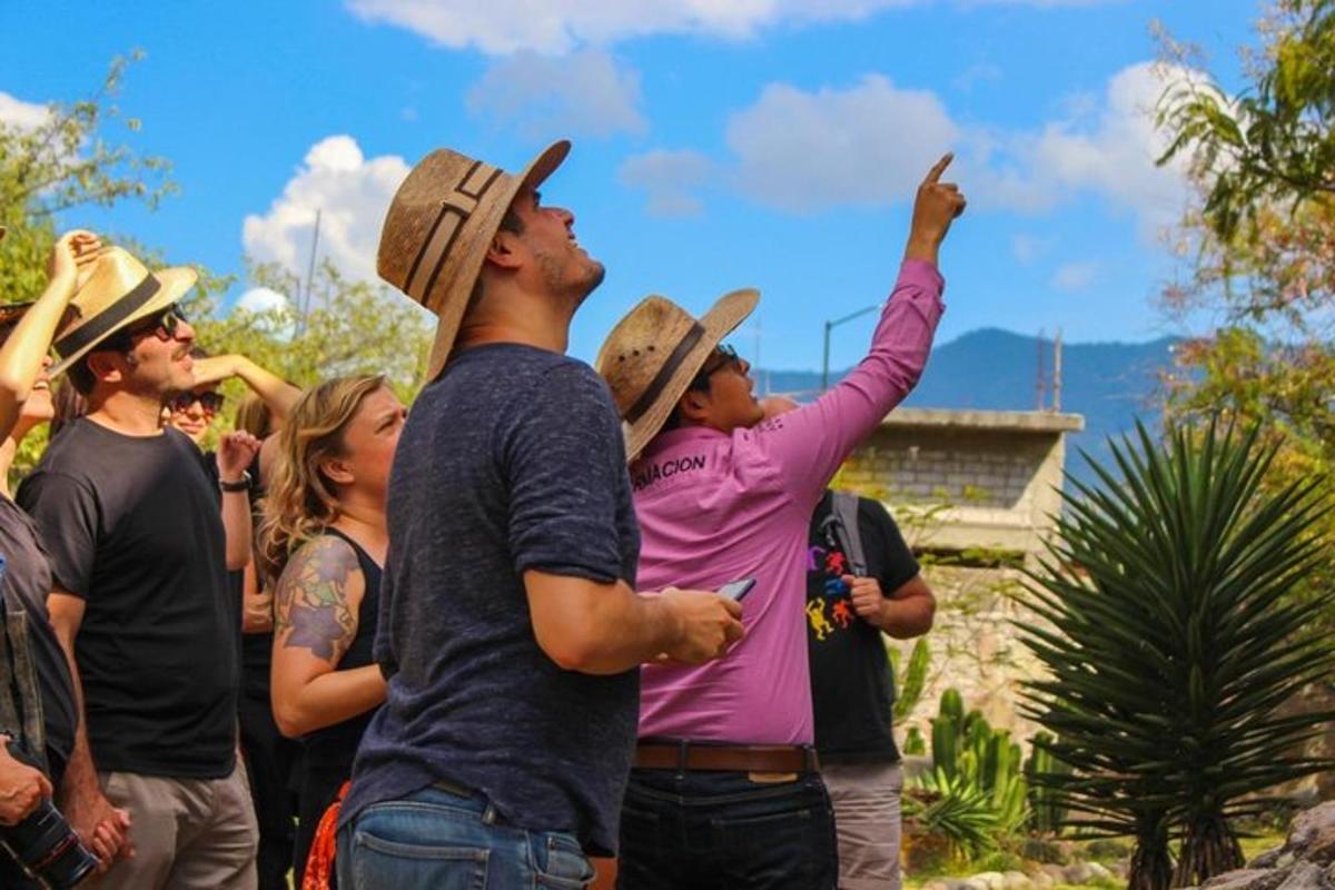 a group of people wearing cowboy hats standing together
