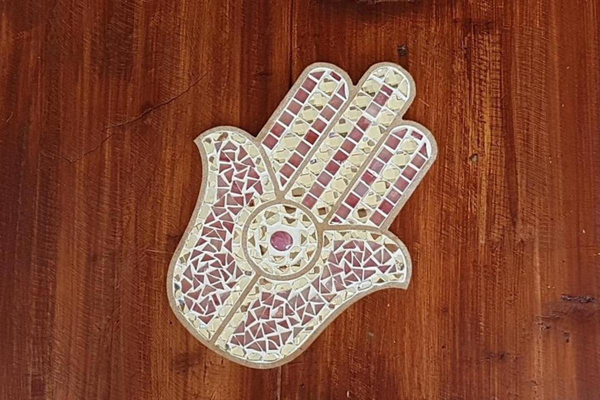 a wooden door with a peace sign on it