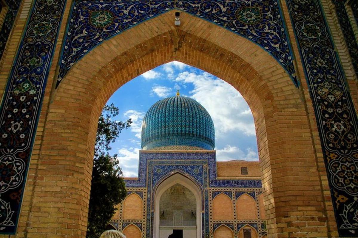 an archway in a building with a mosque