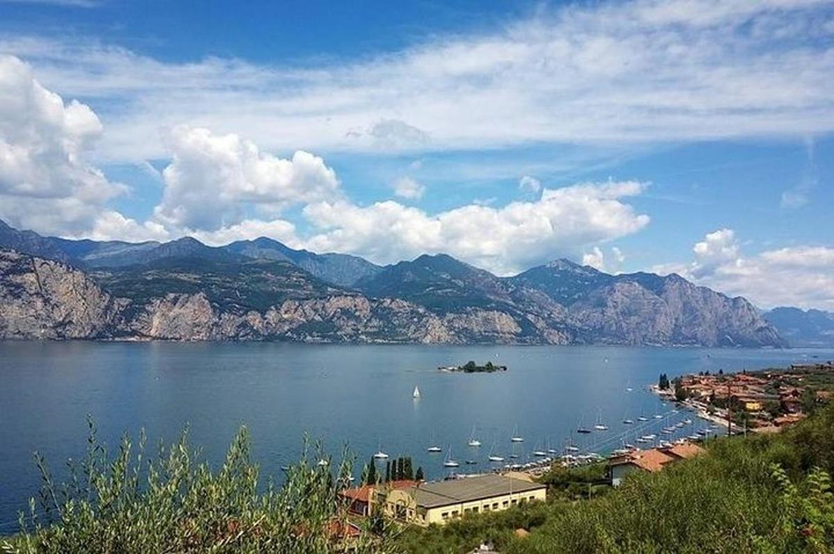 a view of a large body of water with boats