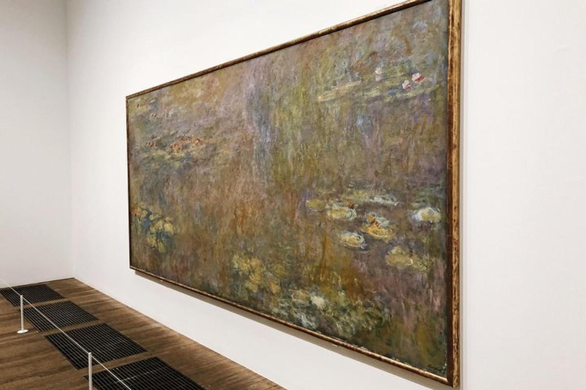 a large painting hanging on a wall in a museum