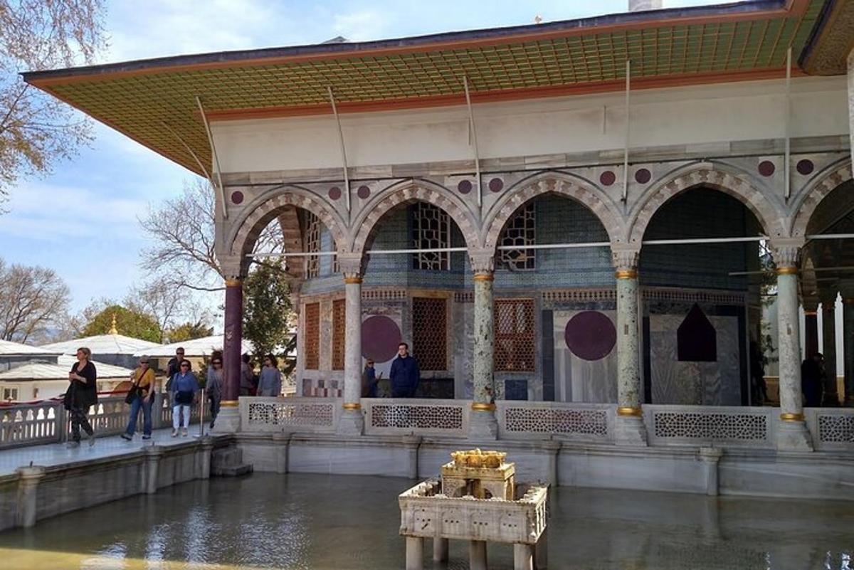 a large building with water in front of it