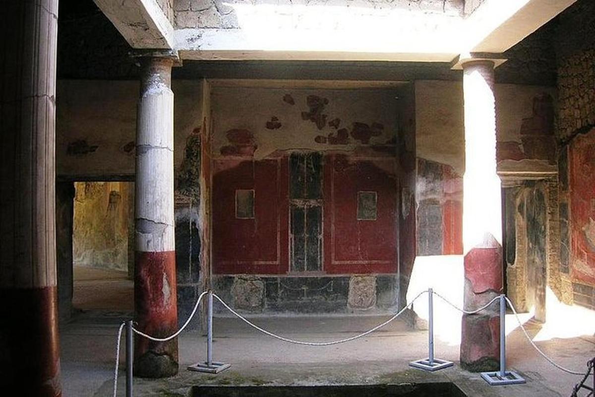 a room with a red door in a building