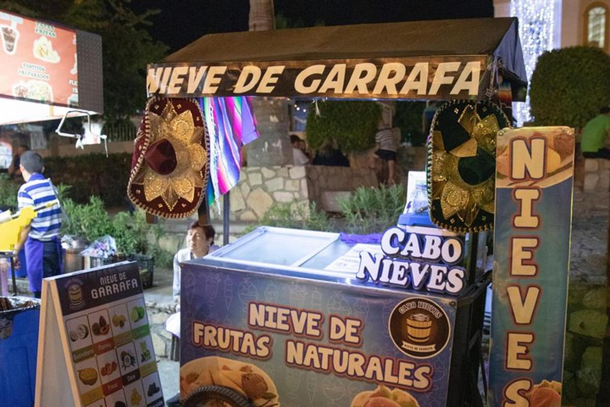 stánek s občerstvením a cedulí s nápisem „byly de carapa a cabo“