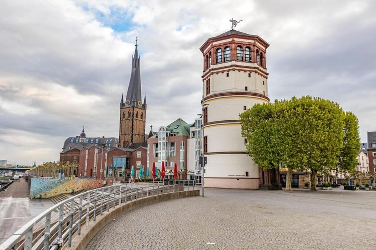 a tall building with a clock tower in a city