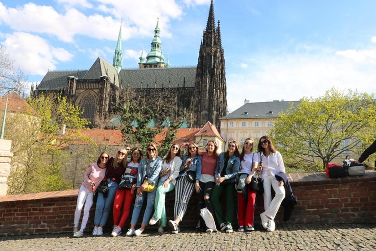 a group of women posing for a picture in front of a building