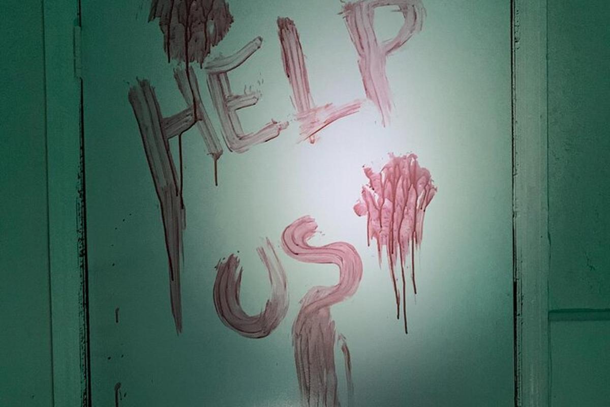 a sign with the word fire painted on a wall