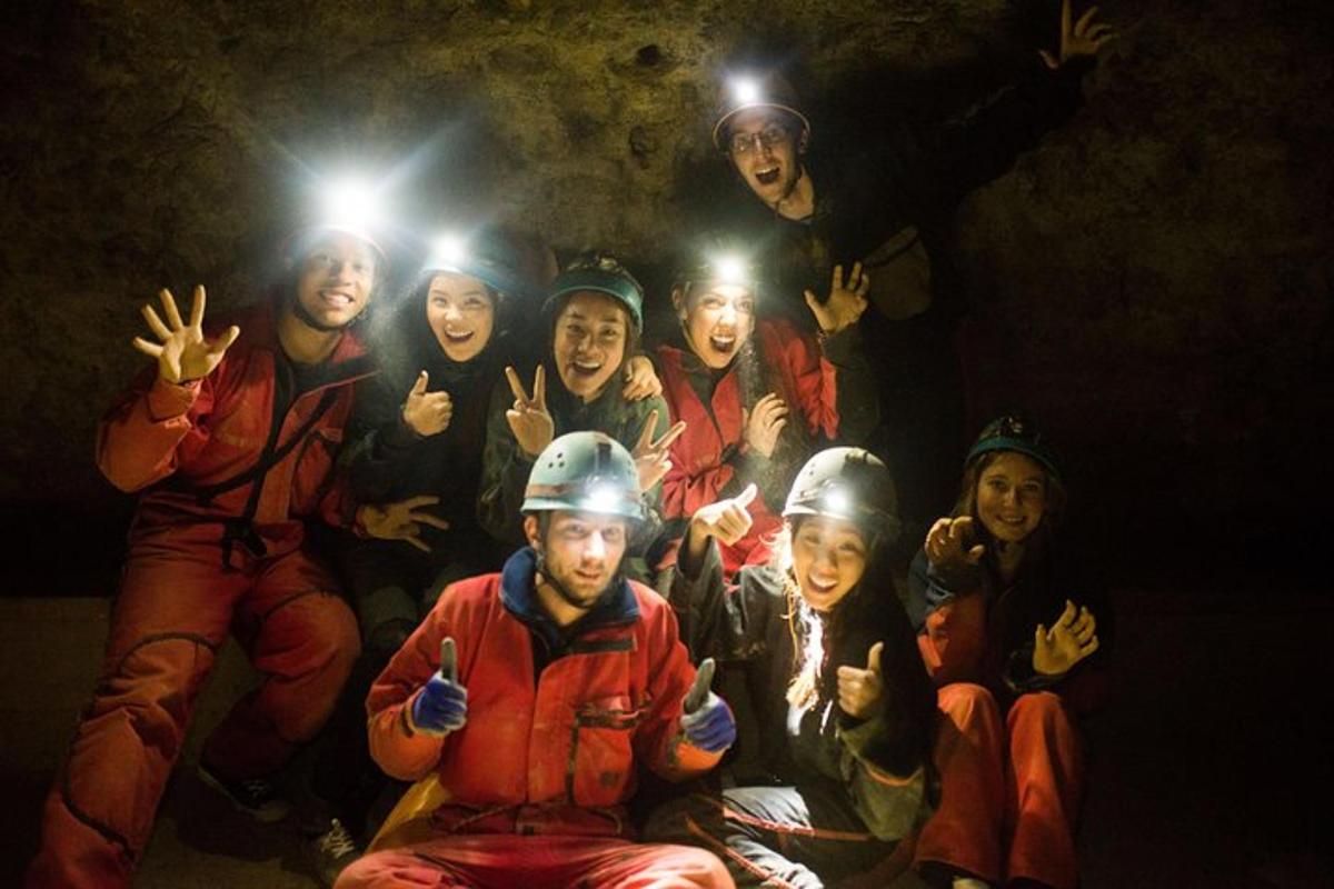 a group of people posing for a picture with their lights