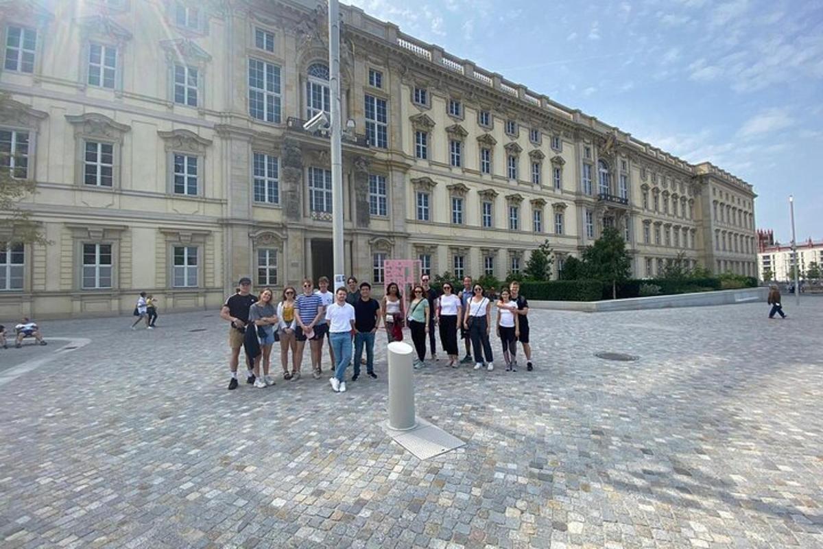 a group of people standing in front of a building