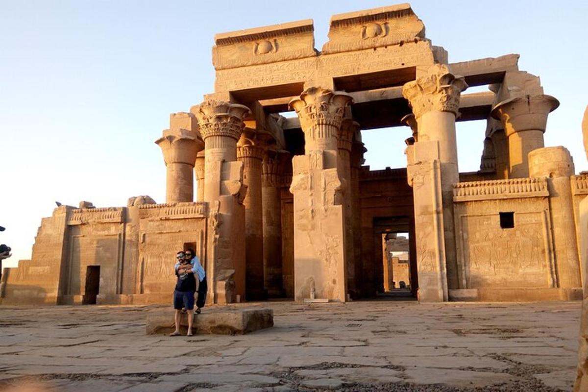a person taking a picture in front of a building