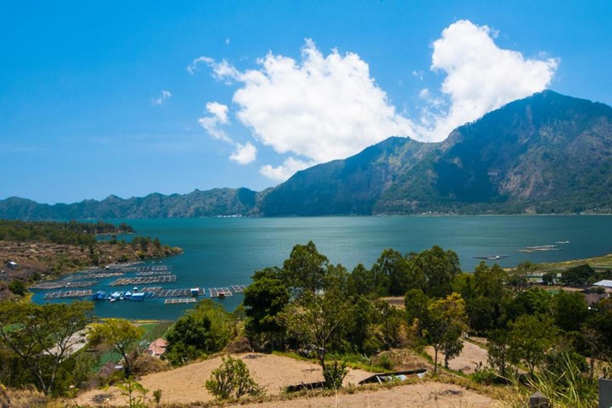 a view of a large body of water with mountains