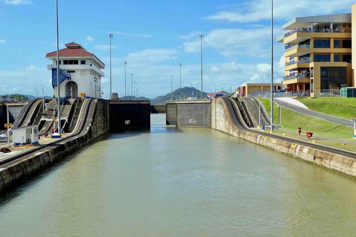 a lock on a river in a city