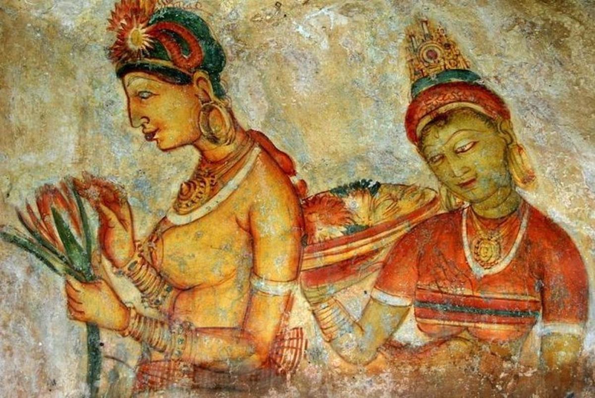 a painting of two women on a wall