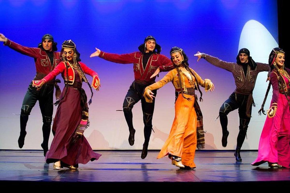 a group of people dancing on a stage