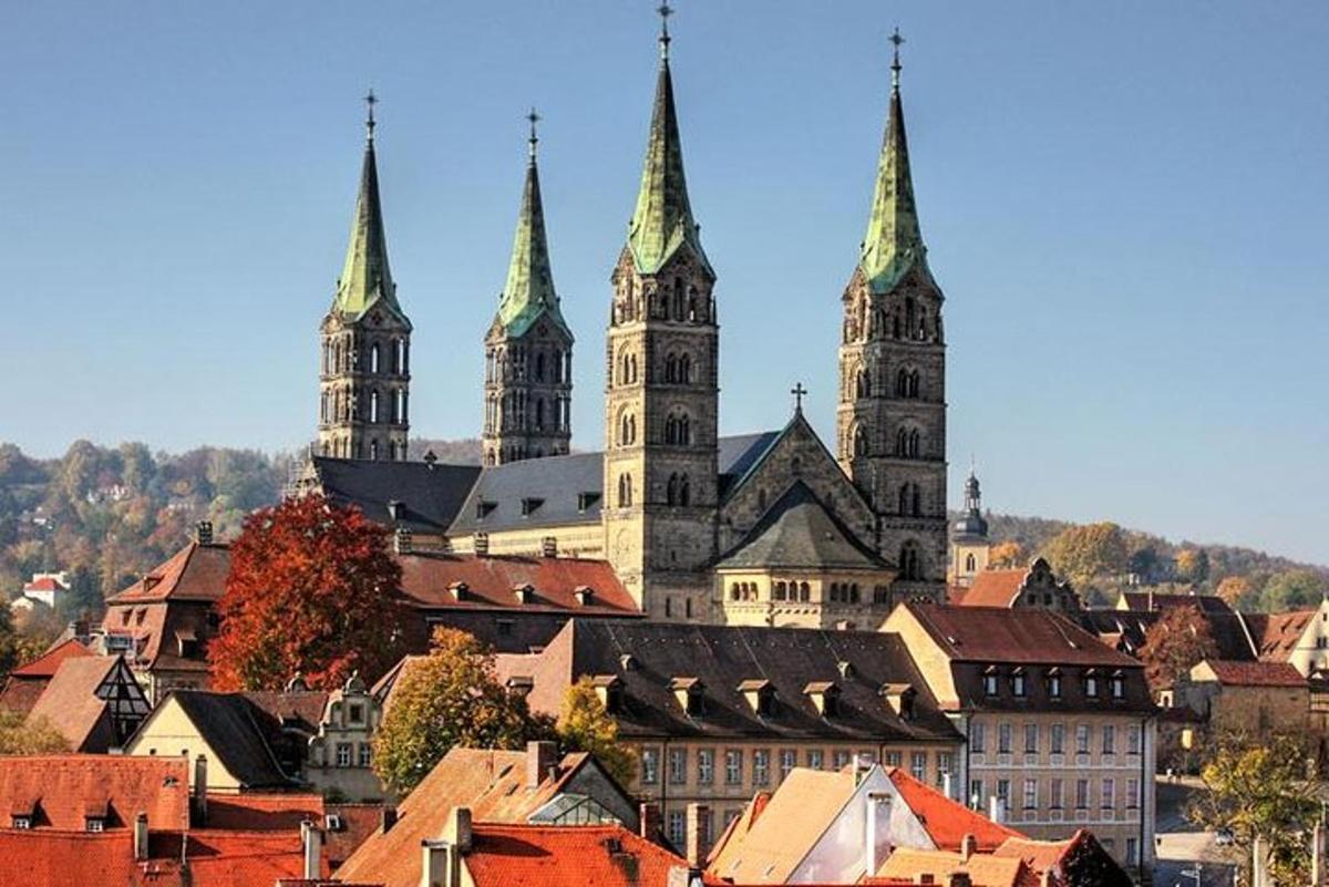 a large building with two towers in a city