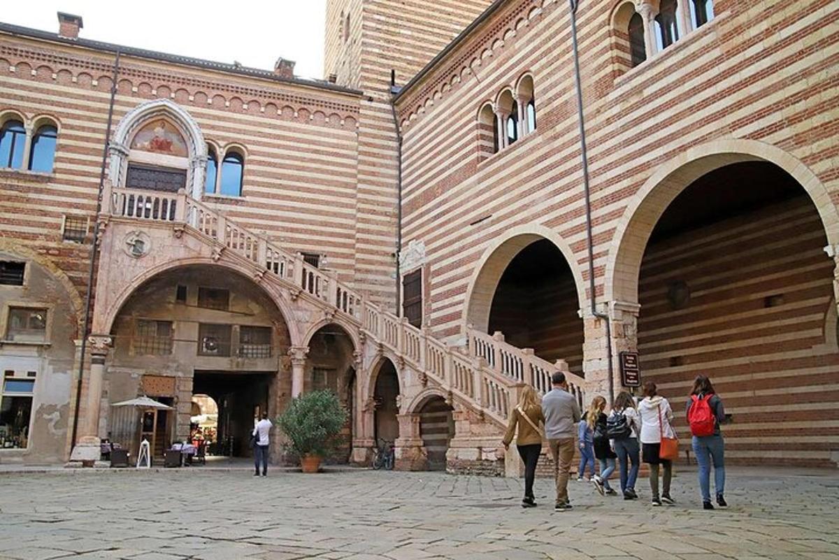a group of people standing outside of a building