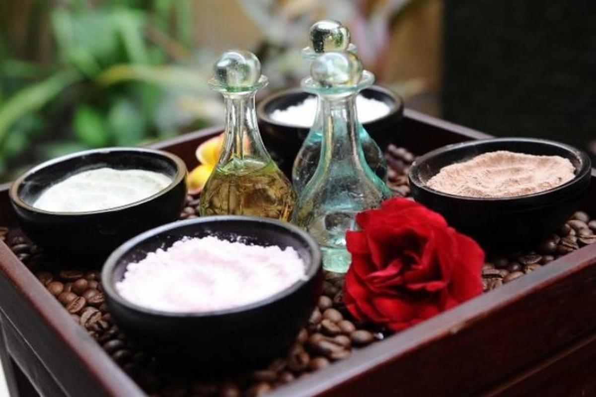 a tray with four bottles of soap and spices