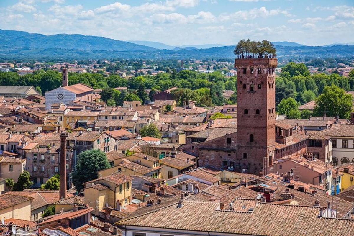 an aerial view of a city with a clock tower