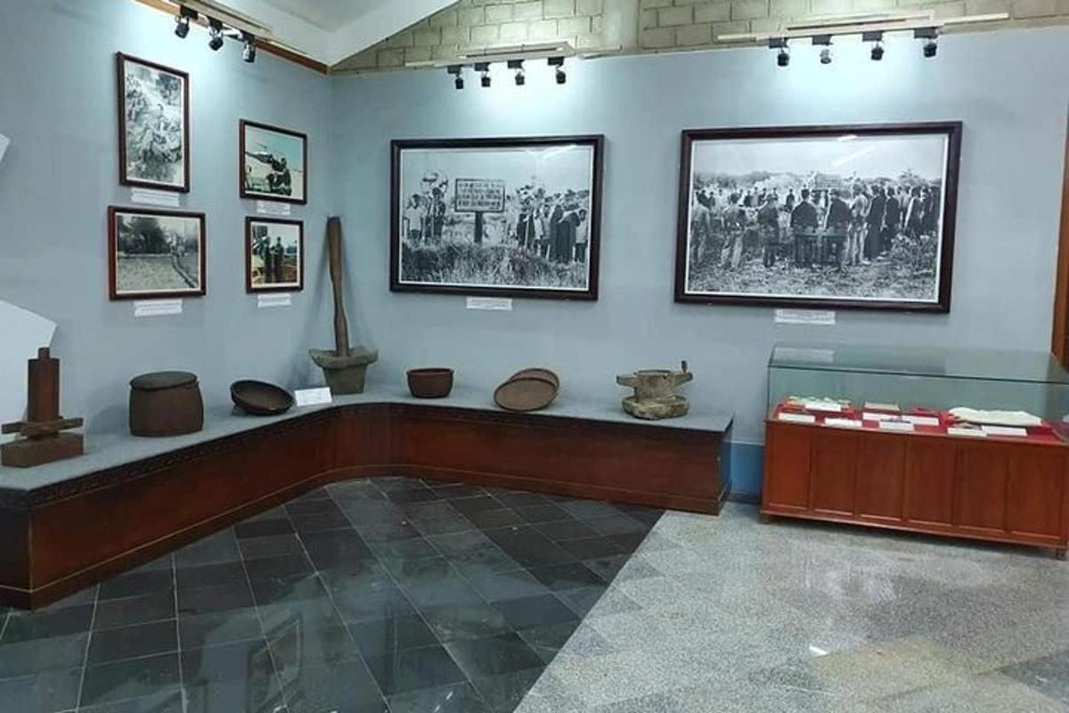 a room with a large room with a large room with photographs on the wall