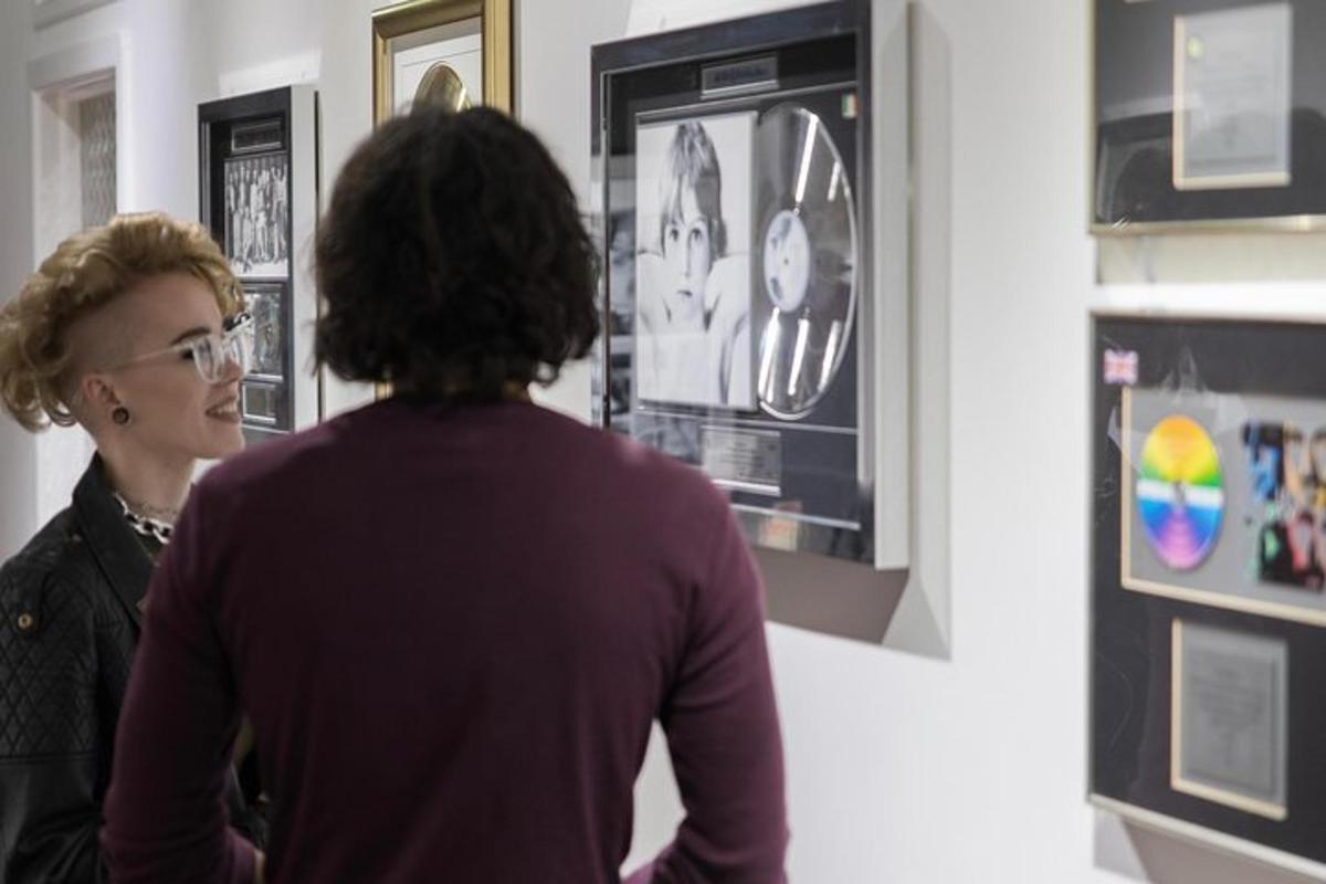 a woman looking at a display in a museum
