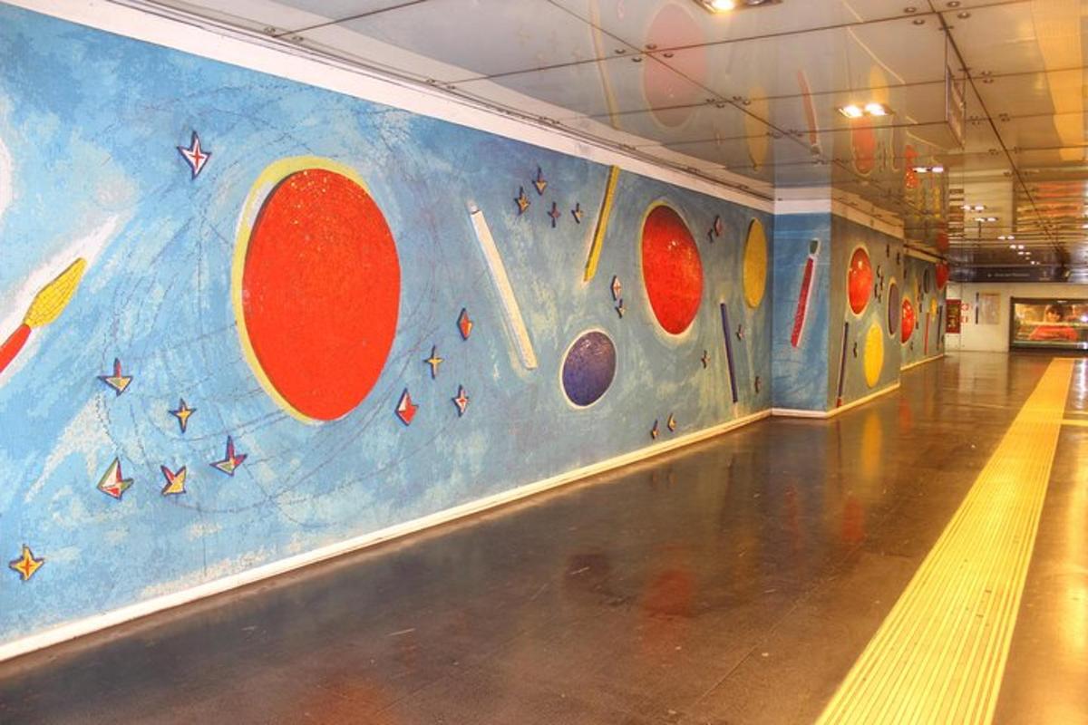 a bowling alley with a mural on the wall