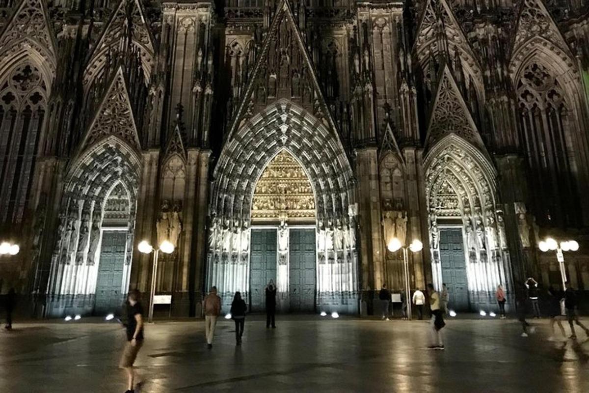 a large building with people walking in it