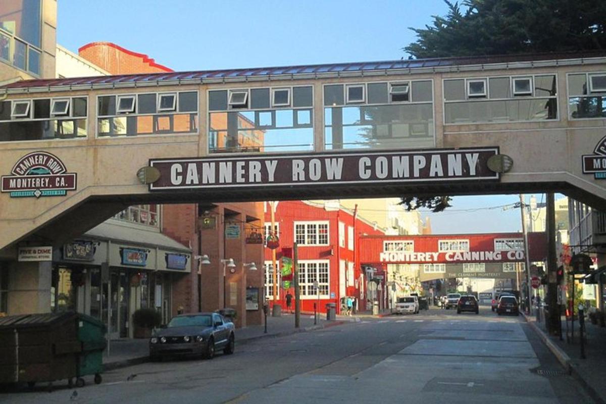a bridge over a street with a sign that reads cemetery row company