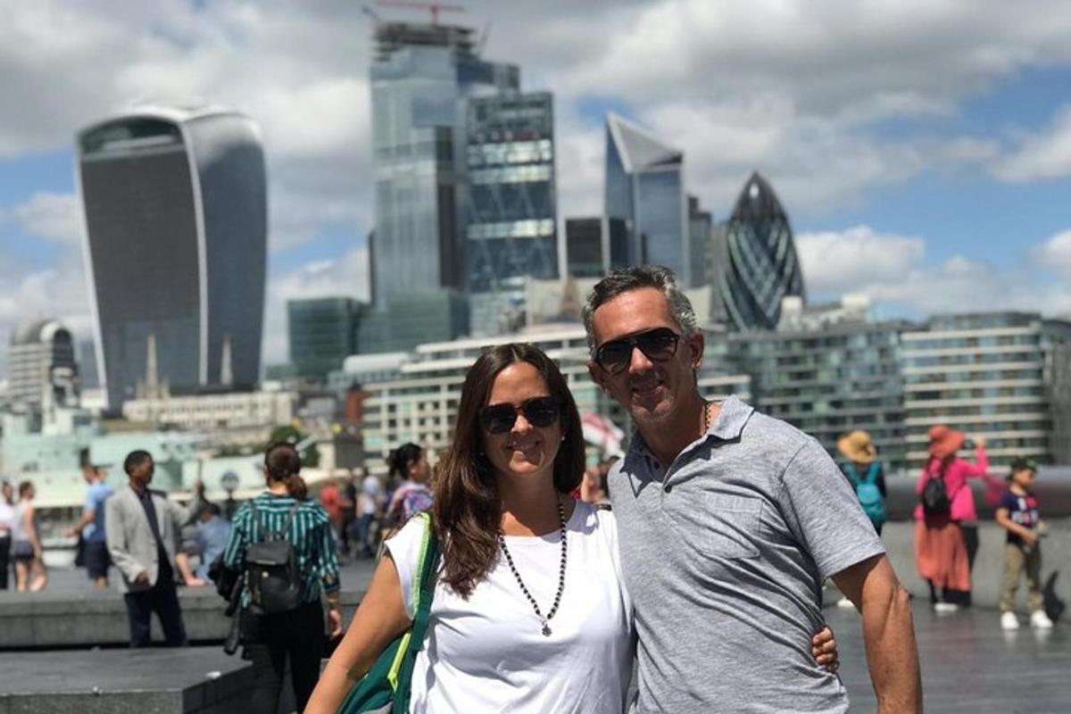 a man and a woman standing in front of a city