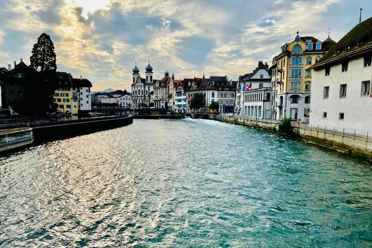 a river in the middle of a city with buildings