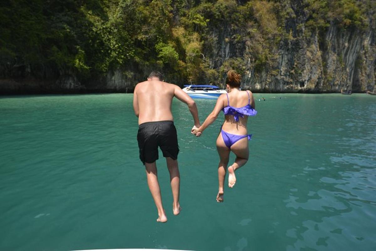 a man and a woman walking in the water