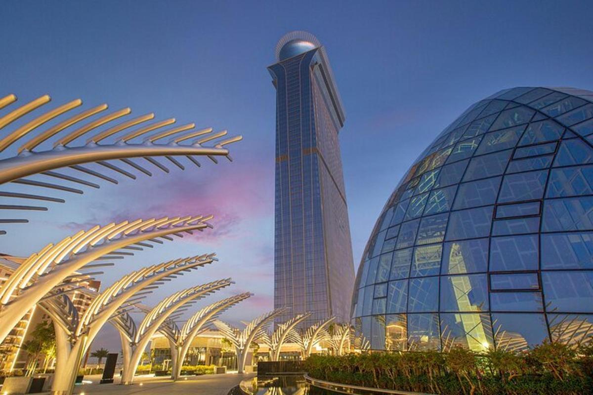 a tall building with domes in front of a building