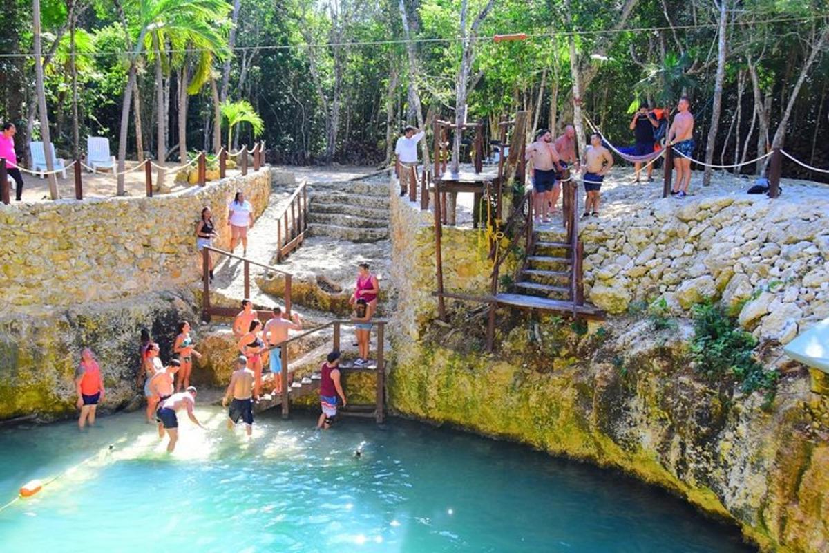 a group of people in the water at a water park