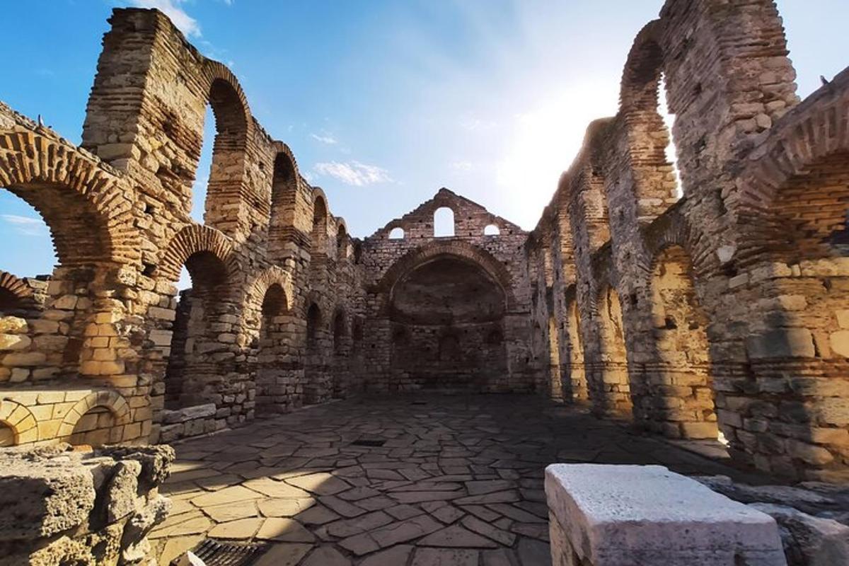 an old stone building with a stone courtyard