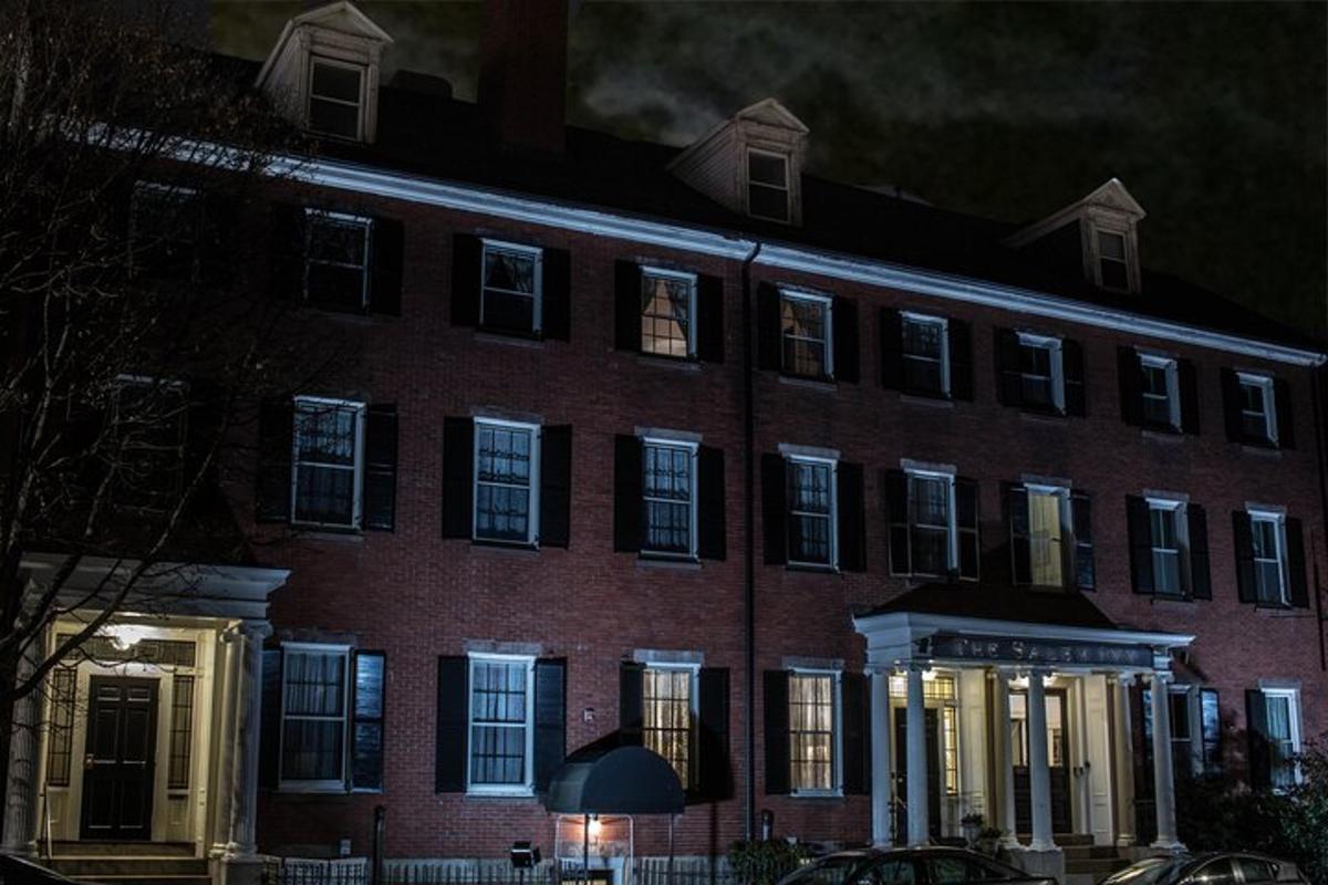 a large red brick building at night