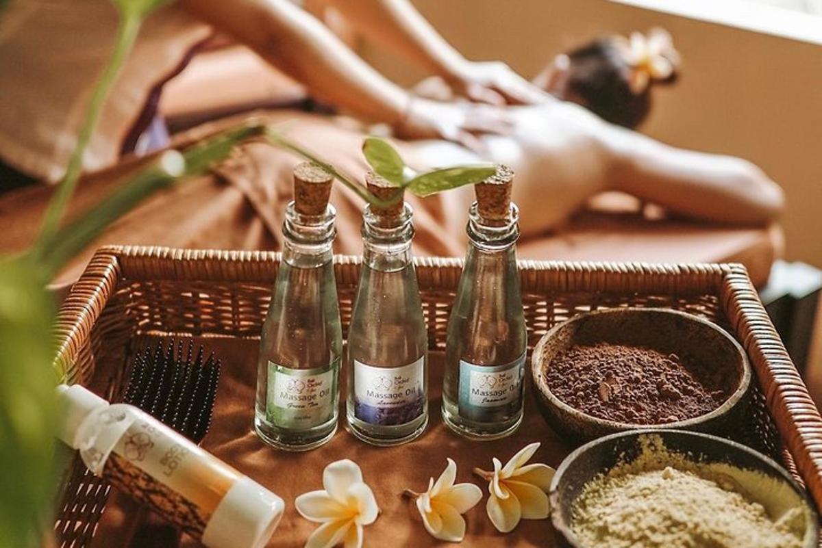 a man in a bath tub with four bottles ofikiikiikiikiikiiki