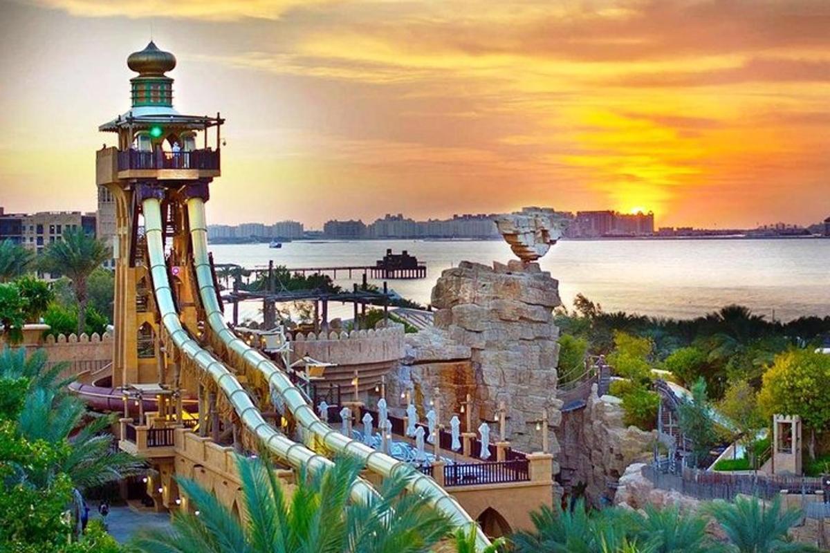 a view of a water park with a roller coaster