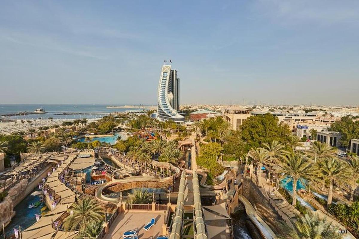 a view of a water park with a roller coaster