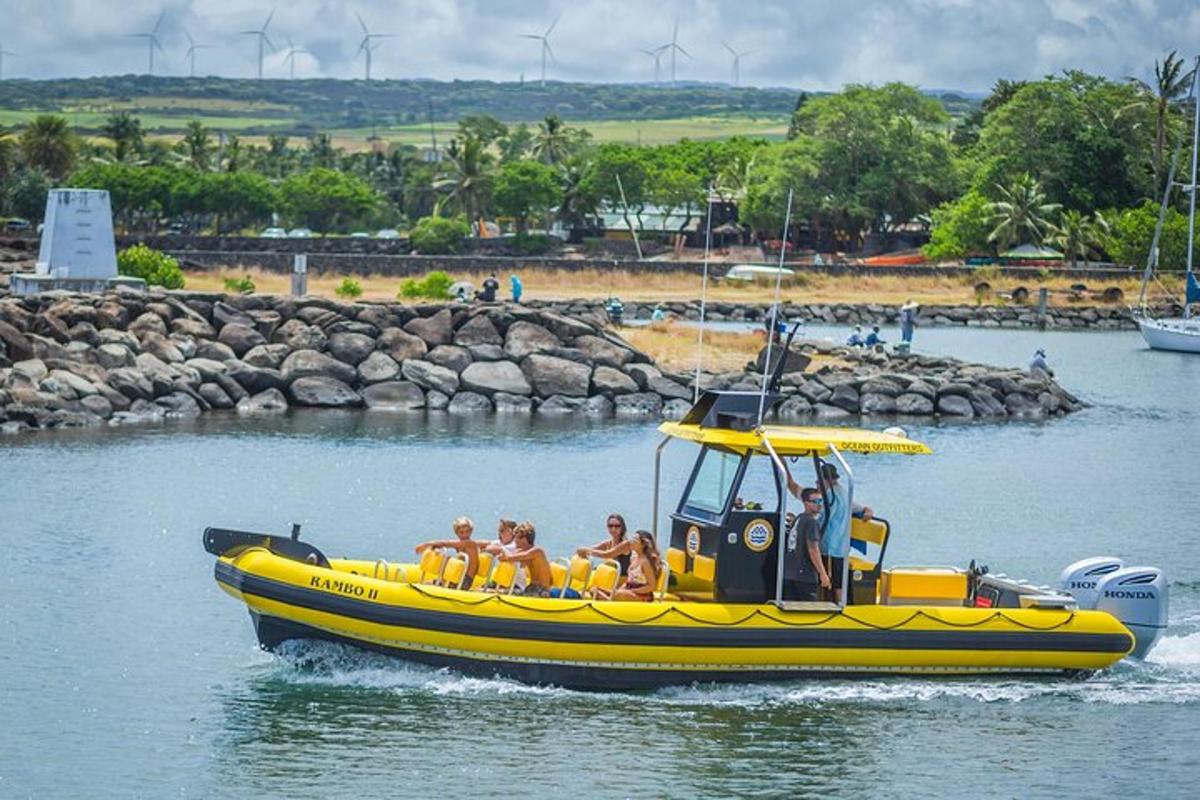a group of people riding a yellow boat on the water