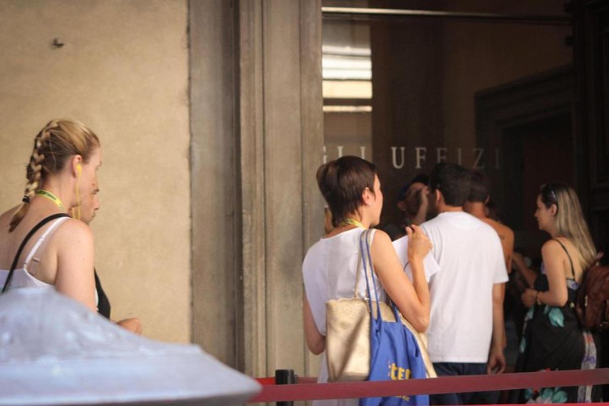 a group of people standing outside of a building