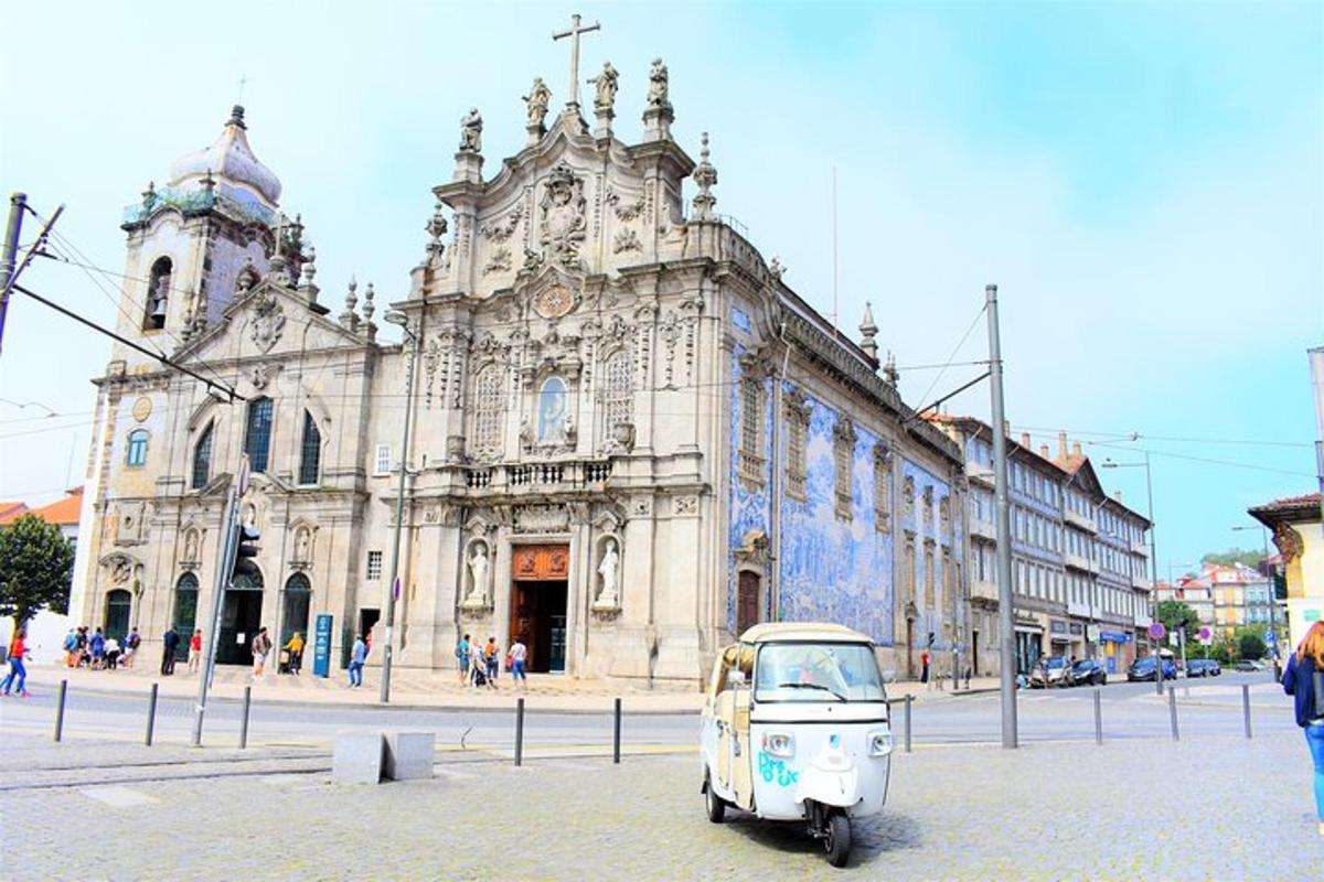 a small car parked in front of a building