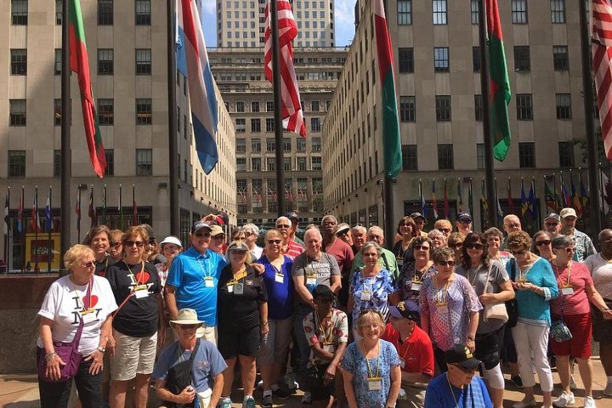 a large group of people standing in front of a building
