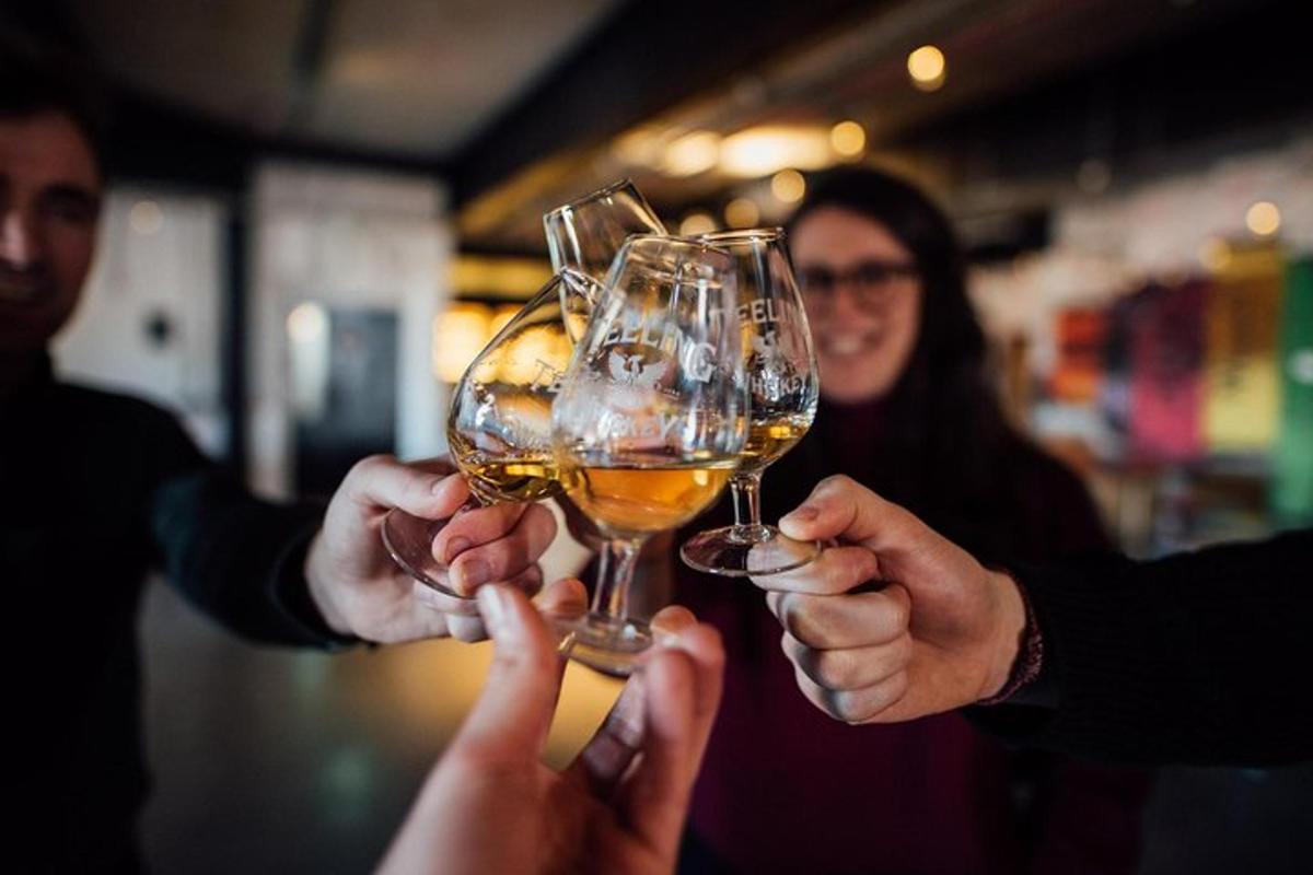 a group of people holding up glasses of wine